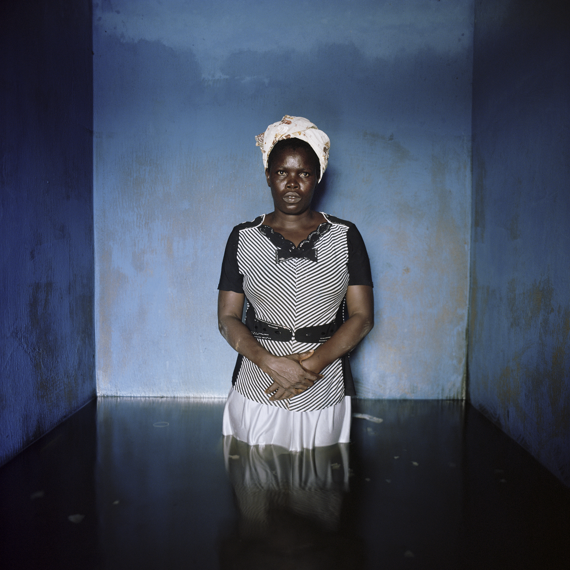 SUBMERGED PORTRAITS. Florence Abraham Igbogene Bayelsa Stte Nigeria November 2012. ©Gideon Mendel